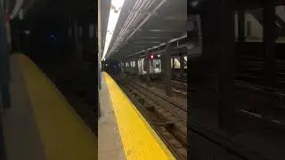 R160B (E) Express Train to Manhattan (World Trade Center) passing by Grand Avenue/Newtown Station