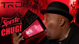 Выплевываю спрайт из гигантского ведра попкорна TRON ARES!