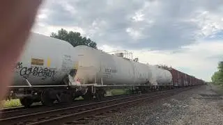 Norfolk southern 4001 leading mixed freight, with refrigerant leak on tanker car!!