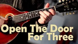 Mandolin tunes. Open the door for three (slip jig)