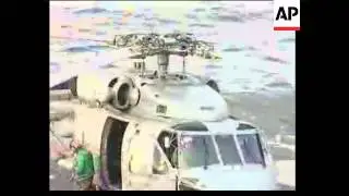 Preps aboard USS Lincoln for aid operation