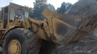 Moving a little stone with a big CAT.
