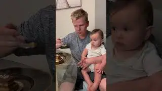 Baby and daddy having an opera cake
