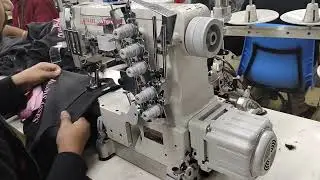 Flatlock sewing machine. bottom top shin. very skill operator. sweet shirt.