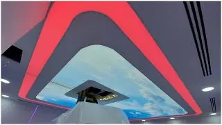 Barrisol stretch ceiling with backlit and art print