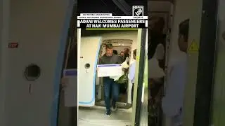 Adani Group Chairman Gautam Adani welcomes passengers as NMIA begins operations
