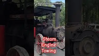 Eclipse Steam Engine pulling an antique threshing machine