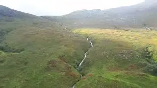 Mountain waterfall feeding loch ba
