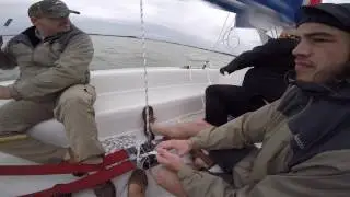 Catalina Capri 16.5 sailing in 16-20 knot winds.