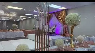 Rose gold Wedding decorations at sunset palace banquet hall.