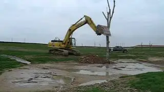Planting Dead Trees at Cross Creek Ranch Eco-Community in Fulshear, Texas.