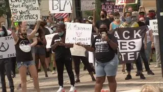 Hundreds of demonstrators gather outside Duval County Courthouse