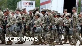Hundreds of Texas National Guard troops arrive in Chicago as judge temporarily blocks deployment