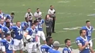 Katerina Reilly sings the National Anthem at Assumption College