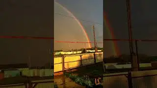 The rainbow, like a bridge, spans the sky, connecting dreams and reality.