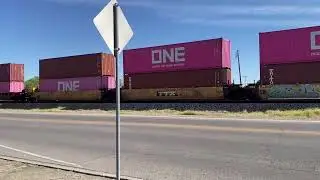 Locomotive light engine move and Intermodel train cross paths