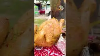 Grilled chicken cooked inside a bamboo tube