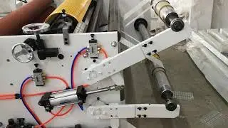 Slitting rewinding width auto loading unwind part