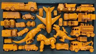 cleans toys,airplane,dinosaur,dragon,firefighter,tow truck,mcqueen car,sailing boat,tank,army truck