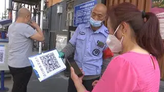 GLOBALink | Beijing steps up COVID-19 prevention measures in some communities