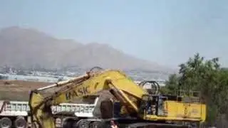 Komatsu PC1000 in action loading trailer