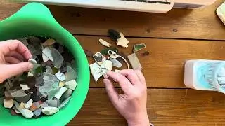 Beach combing treasures: sea glass and pottery shards 