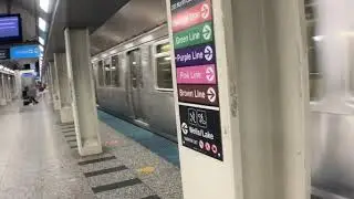 CHICAGO: CTA Blue Line/ Clark and Lake Station - Train arriving at station