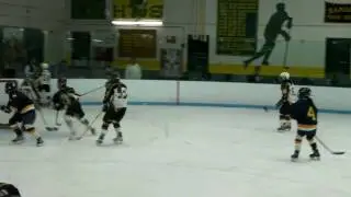 Hamden girls Hockey  player Tyler Thompson scores at the buzzer to beat Simsbury 3-2
