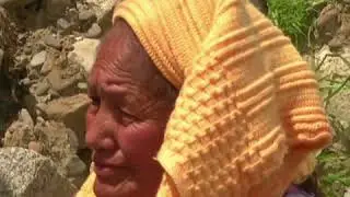 Homes collapse over hillside after heavy rains in Bolivia