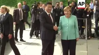 Merkel welcomes China's Xi to Germany