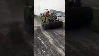 installing grass on the side of the road using heavy equipment #construction #popular #road #shorts