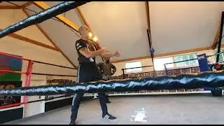 my boxing coach giving some boxing tips