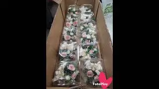 Behind the scenes at a local flower shop ..making wedding flowers ..