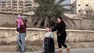 GRAPHIC WARNING: Deaths in Syria's Aleppo as government forces, SDF trade blame | REUTERS