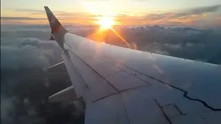 Pouso no Aeroporto de Guarulhos no Boeing 737-800 da Gol com um belo nascer do sol