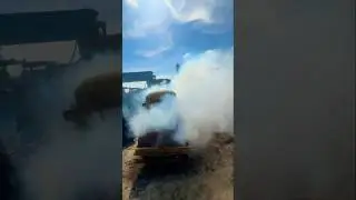 The car was on fire and there was a lot of smoke.