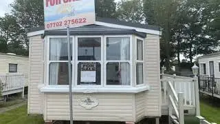 Cheap caravan with decking free fees too