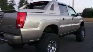 2002 CADILLAC ESCALADE EXT LIFTED 4WD AT KOLENBERG MOTORS LTD