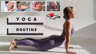 Healthy young woman in sportswear doing push ups on fitness mat in front the sofa. exercising