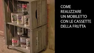 Mobiletto con cassette della frutta e tinta all'acqua