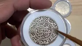 الريال و نصف الريال الحسني  لسنة 1299