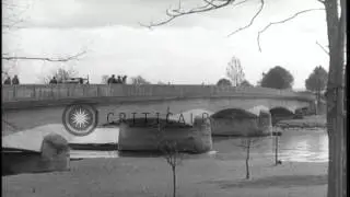 US Army 12th Armored Division soldiers cross the Danube River bridge at Dillingen...HD Stock Footage