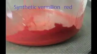 Synthetic vermilion - red inorganic pigment
