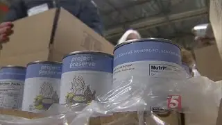 Second Harvest Food Bank, Volunteers Gather Food For Families In Need