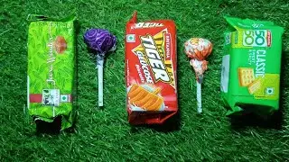 Satisfying video asmr jeera biscuit and moto lolipop candy unboxing video 🍪🍪🍭🍭