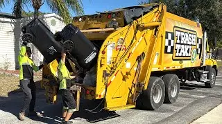 Trash Taxi&rsquo;s Freightliner Leach Rear Loader Garbage Truck with a Special Helper