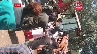 Unruly mob attacks Anti Encroachment to clear up illegal kiosks on Spicer College Road in Aundh,