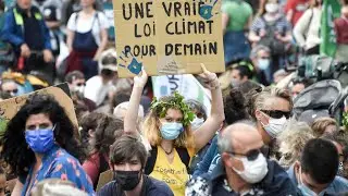 Thousands march in France demanding real action on climate change