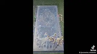 the graves of Dimebag Darrell and Vinnie Paul