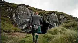 Scotsman Walking To King's Cave On History Visit To Island Of Arran Firth of Clyde Scotland